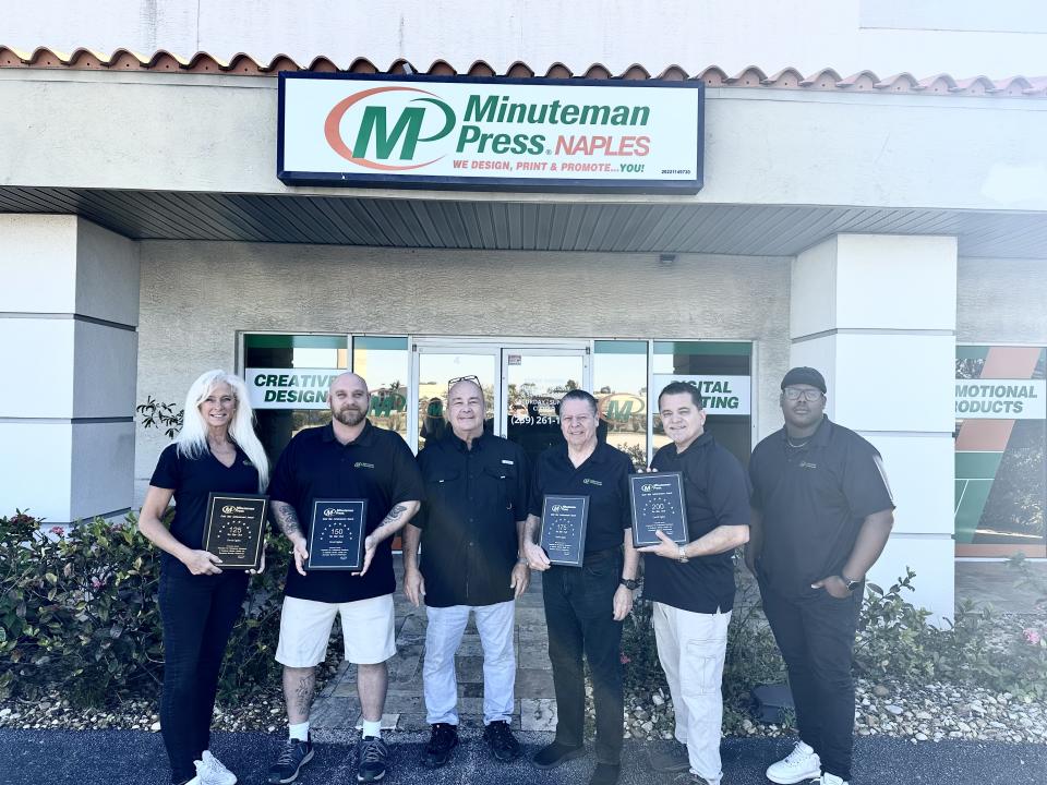 Minuteman Press franchise, Naples, FL – Owner David Ogden (3rd from left) and team.