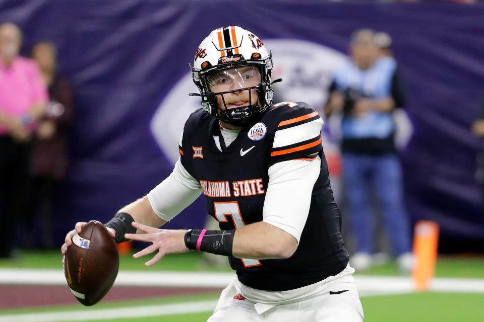 Oklahoma State quarterback Alan Bowman sets up to pass during the Cowboys' Texas Bowl victory over Texas A&M on Dec. 27 in Houston. An NCAA panel last week granted Bowman a seventh year of eligibility.