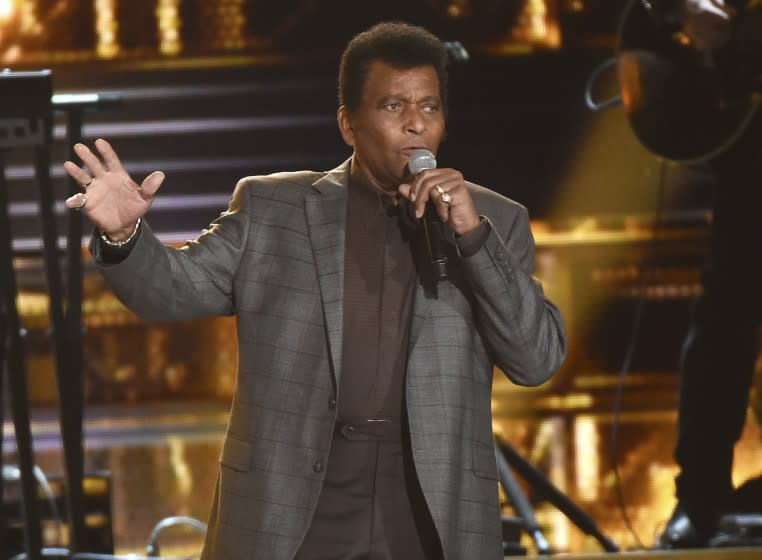 FILE - Charley Pride performs "Kiss An Angel Good Morning" at the 50th annual CMA Awards in Nashville, Tenn. on Nov. 3, 2016. Pride will get a lifetime achievement award at the CMA Awards in November. (Photo by Charles Sykes/Invision/AP, File)