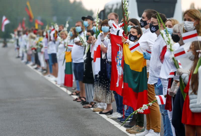 A human chain in support of protesters in Belarus, in Medininkai