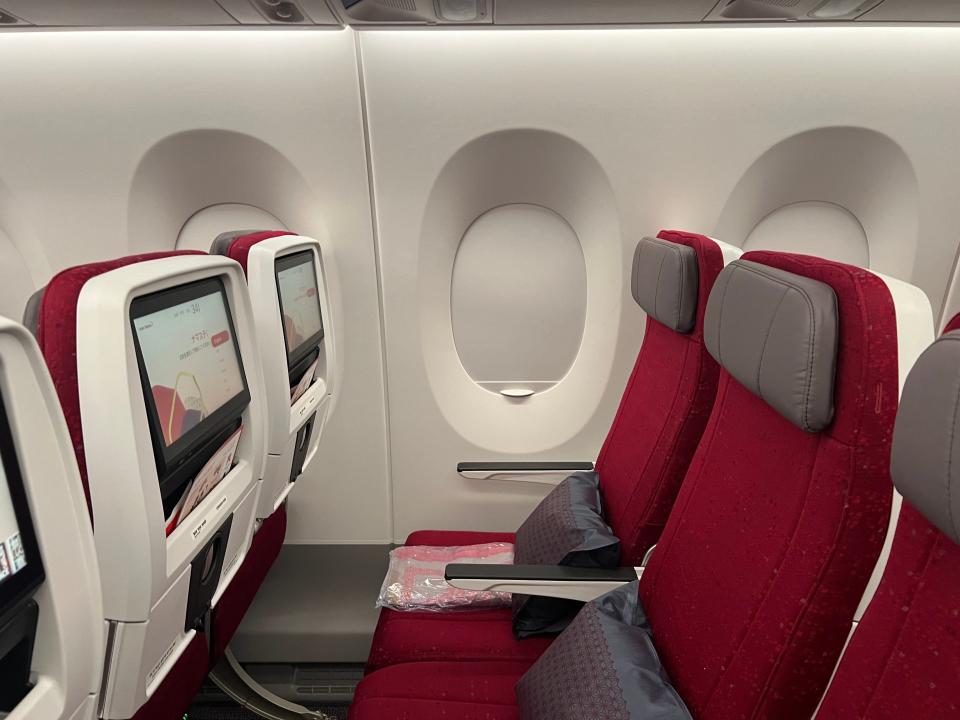 The new Air India economy seats are red with grey headrests.