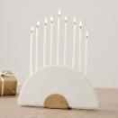 <p><strong>West Elm</strong></p><p>westelm.com</p><p><strong>$80.00</strong></p><p>This ain’t your grandmother’s menorah! It looks surprisingly sophisticated for holiday decor, thanks to the hand-cut marble, brass accent, and modern silhouette. </p>