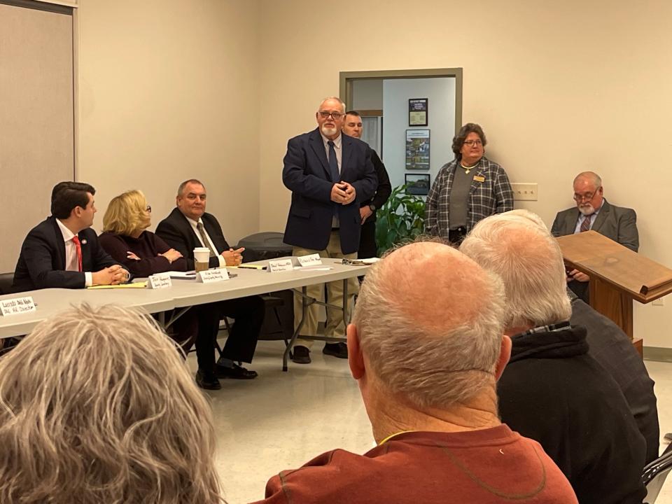 Craigsville Mayor Richard Fox (center, standing)