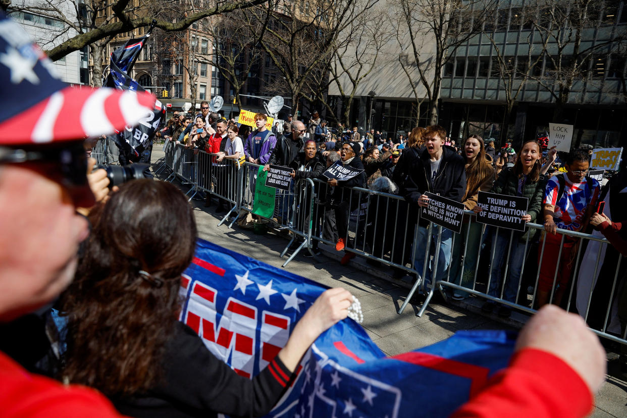 Anti-Trump protesters demonstrate facing Trump supporters outside Manhattan Criminal Courthouse in New York City, on April 4, 2023.