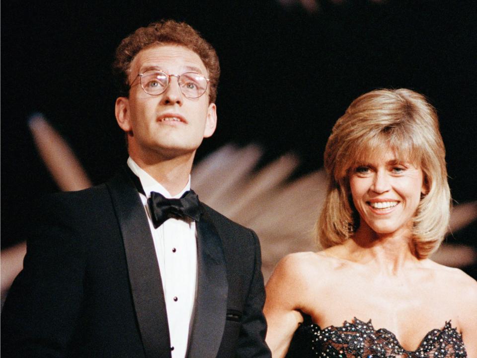 U.S director Steven Soderbergh, left, holds the Golden Palm he was awarded for his film "Sex, Lies and Videotapes" at the 42nd International Film Festival in Cannes, France May 23, 1989. Next to him is actress Jane Fonda.