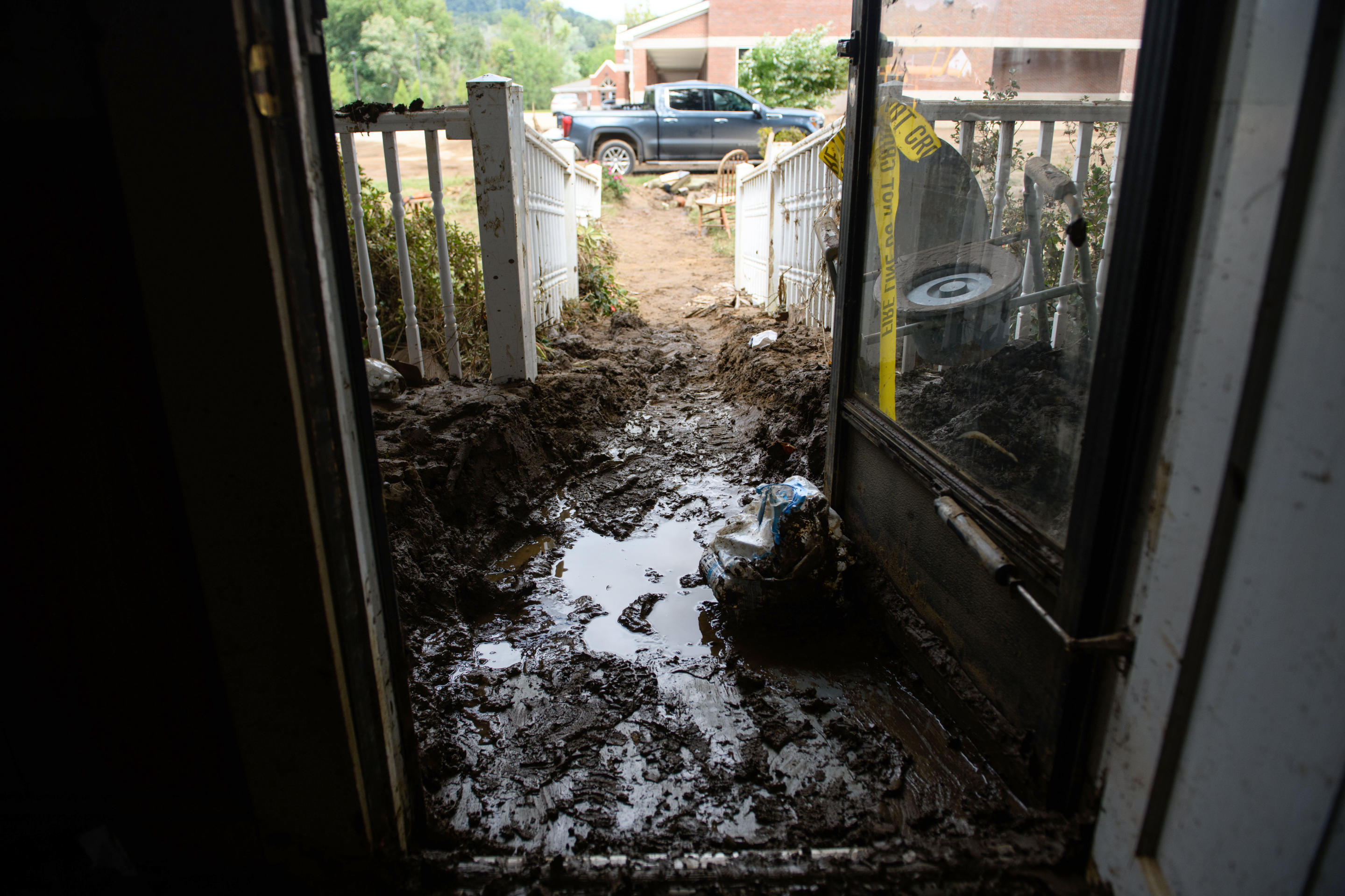 The entrance to a home in Old Fort, North Carolina is covered in thick mud.