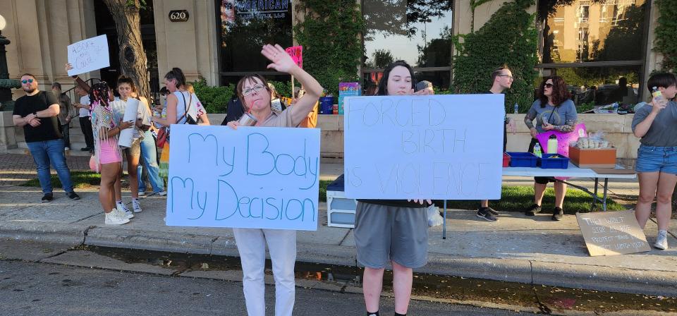 Pro-choice demonstrators protested Thursday evening outside and around Rep. Ronny Jackson's downtown Amarillo office to show their displeasure with the overturning of Roe vs. Wade by the Supreme Court.