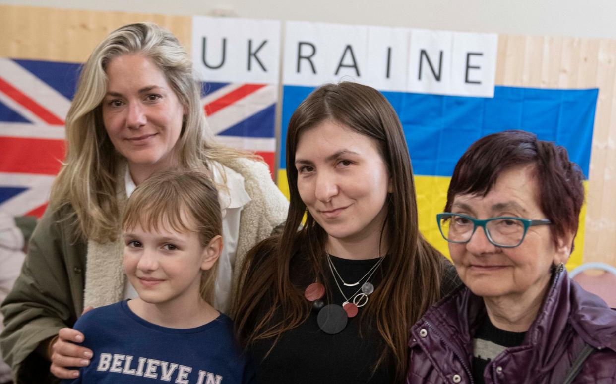 Harriet Asher, second right, has helped organise transport with Coaches 2 Ukraine to bring refugees to safety in Britain - Julian Simmonds for The Telegraph