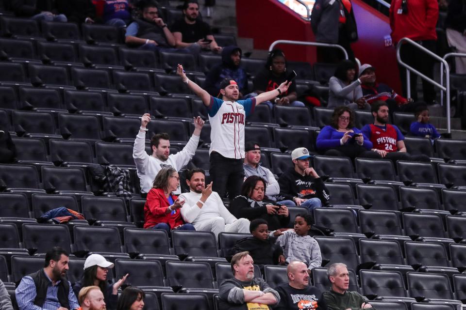 Pistons fans react to a play against the Grizzlies during the second half of the Pistons' 116-102 loss on Wednesday, Dec. 6, 2023, at Little Caesars Arena.