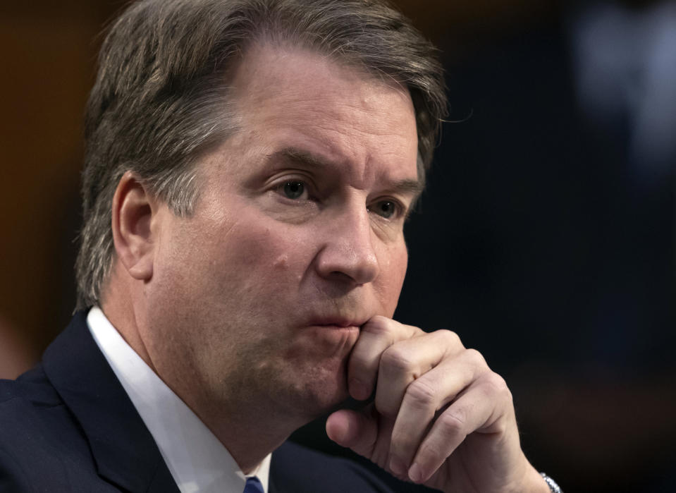 FILE - In this Sept. 6, 2018, file photo, after more than an hour of delay over procedural questions, President Donald Trump's Supreme Court nominee Brett Kavanaugh waits to testify before the Senate Judiciary Committee for the third day of his confirmation hearing, on Capitol Hill in Washington. Christine Blasey Ford, the woman accusing Kavanaugh of sexual misconduct when they were teenagers has come forward to The Washington Post. (AP Photo/J. Scott Applewhite, File)