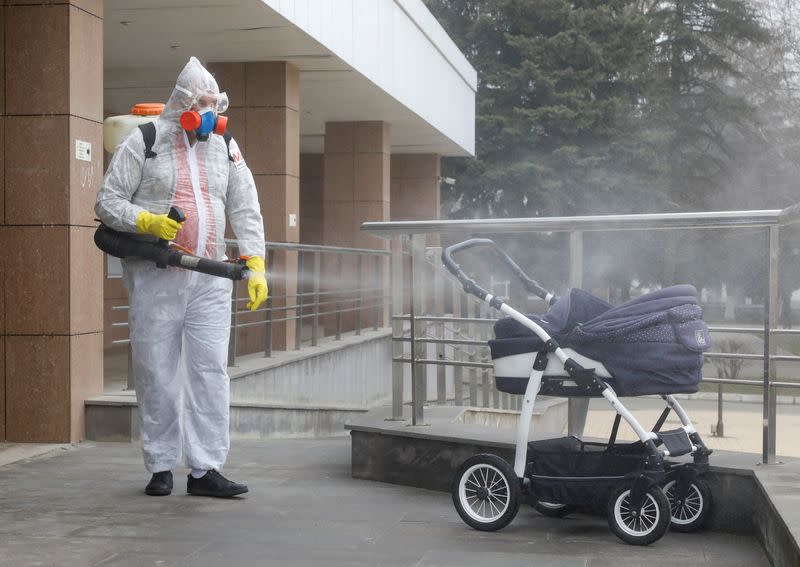 FILE PHOTO: A specialist sanitizes a child health centre to prevent the spread of the coronavirus disease in Stavropol