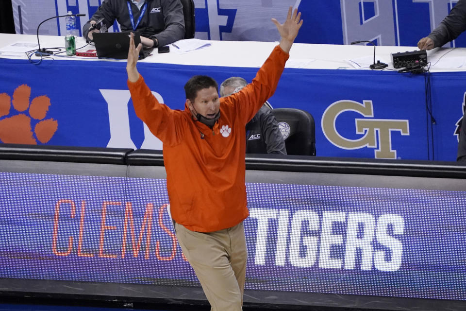 Clemson head coach Brad Brownwell reacts to a play during the second half of an NCAA college basketball game against Miami in the second round of the Atlantic Coast Conference tournament in Greensboro, N.C., Wednesday, March 10, 2021. Miami won the game 67-64. (AP Photo/Gerry Broome)