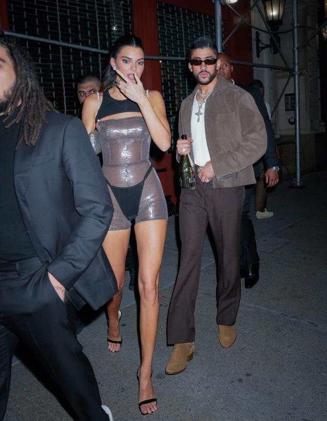 Kendall Jenner shows off her toned arms in a corset with brown leather  slacks for a night out in LA