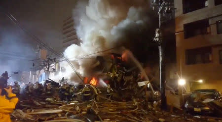 A view of a site of an explosion at a bar in Sapporo, Japan, December 16, 2018 in this still image taken from a video obtained from social media. TWITTER / @syurikenbouya/via REUTERS