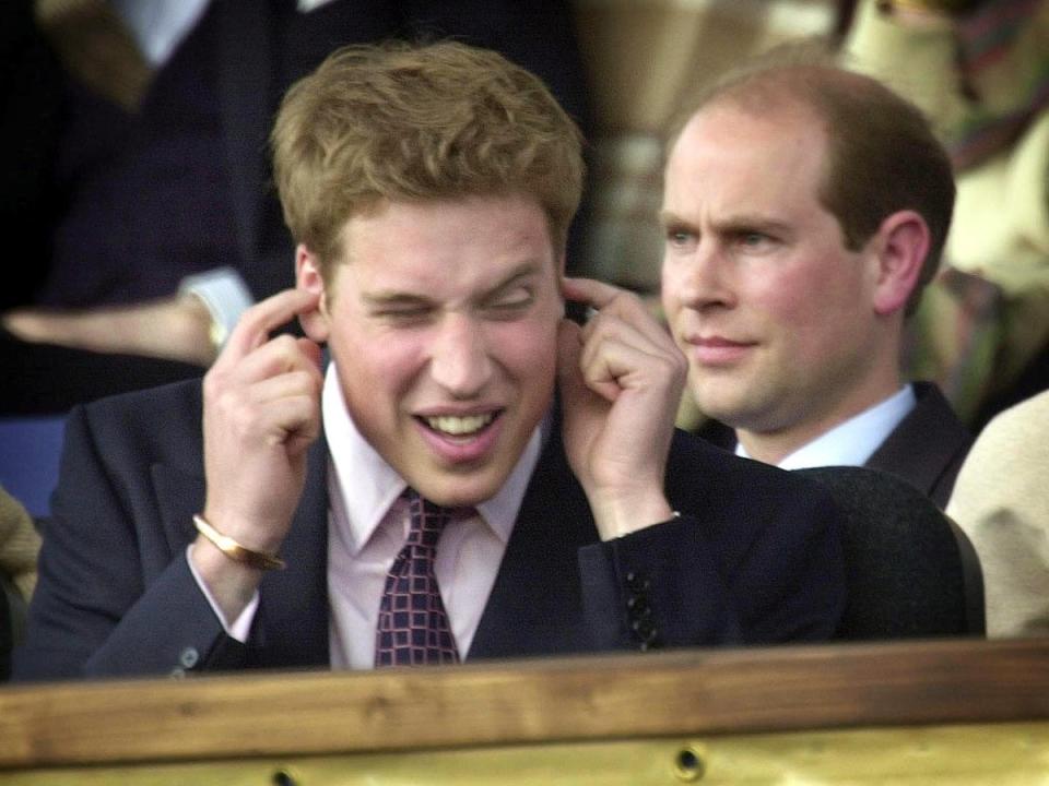 Prince William blocks his ears during Party at the Palace in the summer of 2002 (Getty Images)