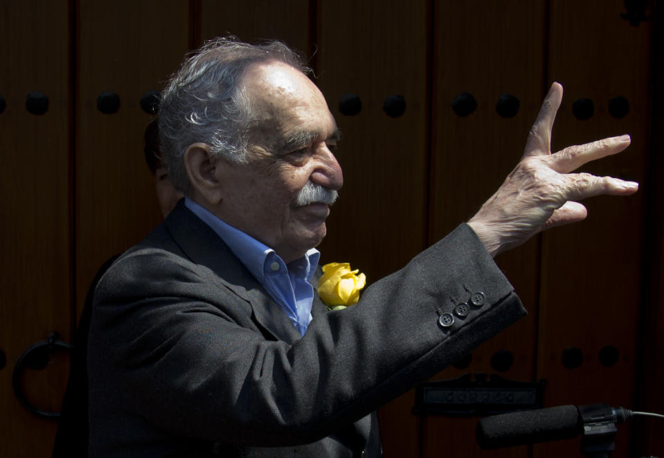 In this March 6, 2014 photo, Colombian Nobel Literature laureate Gabriel Garcia Marquez greets fans and reporters outside his home on his 87th birthday in Mexico City. Garcia Marquez died Thursday April 17, 2014, at his home in Mexico City. The author's magical realist novels and short stories exposed tens of millions of readers to Latin America's passion, superstition, violence and inequality. (AP Photo/Eduardo Verdugo)