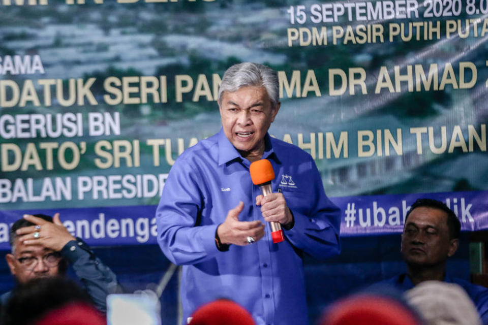BN chairman Datuk Seri Ahmad Zahid Hamidi speaks while campaigning for Shahelmey Yahaya, BN Tanjung Keramat candidate in Tanjung Keramat, Sabah September 15, 2020. — Picture by Firdaus Latif