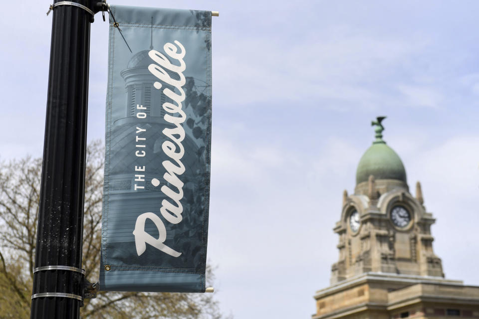 A banner for the city of Painesville is shown on Tuesday, May 10, 2022, in Painesville, Ohio. How much money should CVS, Walgreens and Walmart pharmacies pay two Ohio counties in damages to help them ease the effects of the opioid crisis? That's the question in front of a federal judge in Cleveland, who will begin hearing testimony on Tuesday after a jury found the three giant pharmacy chains responsible last fall for recklessly distributing massive amounts of pain pills in Lake and Trumbull counties (AP Photo/Nick Cammett)