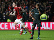 Soccer Football - Carabao Cup Semi Final Second Leg - Bristol City vs Manchester City - Ashton Gate Stadium, Bristol, Britain - January 23, 2018 Bristol City's Aden Flint celebrates scoring their second goal as Manchester City's Fernandinho reacts Action Images via Reuters/Carl Recine