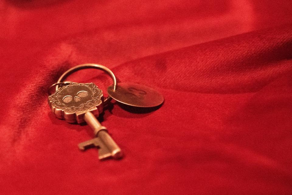 A membership key, needed for private group events, is seen at The Haunt, a horror-themed speakeasy inside Halloween attraction Slaughterhouse.