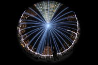 <p>Taken on his back using a fisheye lens, The Tribute in Light rises above the New York skyline from the National September 11 Memorial & Museum on Sept. 11, 2017. (Gordon Donovan/Yahoo News) </p>