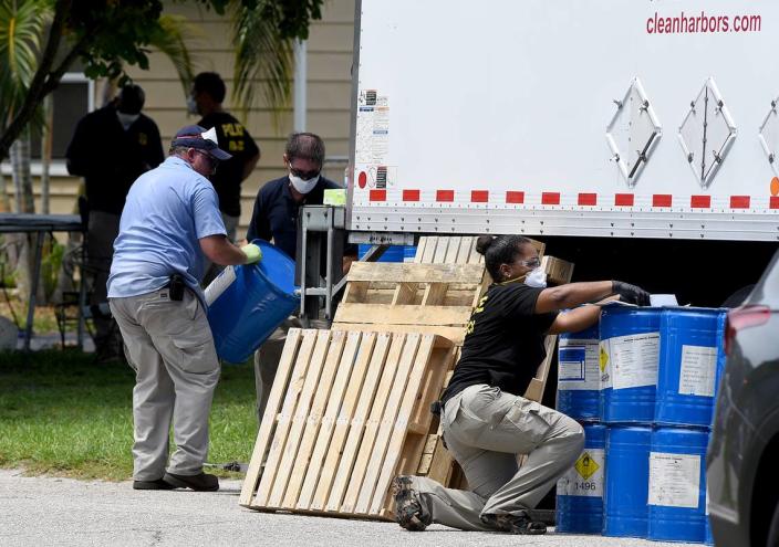 The FDA’s Office of Criminal Investigations was on the scene where a Bradenton family who marketed a toxic bleaching agent as cure for COVID-19 and other serious diseases and conditions now faces federal criminal charges. They were seen removing large drums of some chemical from the home. Tiffany Tompkins/ttompkins@bradenton.com