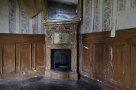 The fireplace of the 120 sq. meters (1,300 sq. feet) stone house where the Nobel-winning scientist couple Marie Sklodowska-Curie and Pierre Curie spent vacation and weekends from 1904-1906 in Saint-Remy-les-Chevreuse, on the south-west outskirts of Paris, France, Wednesday, May 12, 2021. Poland's prime minister Mateusz Morawiecki says he's given instructions for the government to buy 790,000 euro house in France, and said on Twitter Tuesday that the house, is a "part of Poland's history." (AP Photo/Francois Mori)