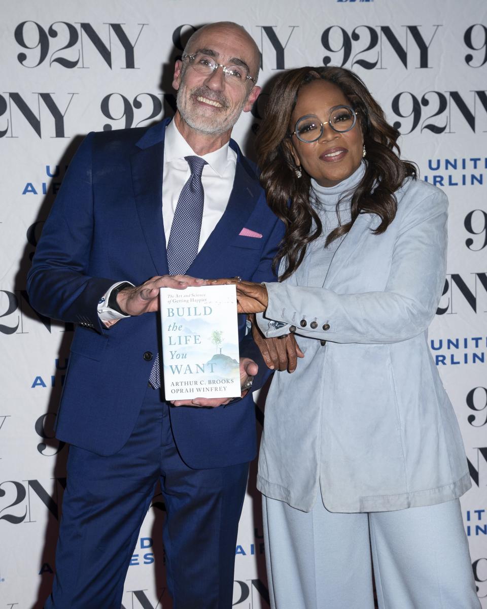 Arthur C. Brooks and Oprah Winfrey pose backstage before discussing their new book “Building the Life You Want: The Art and Science of Getting Happier” at the 92nd Street Y on Tuesday, Sept. 12, 2023, in New York. | Christopher Smith, Associated Press