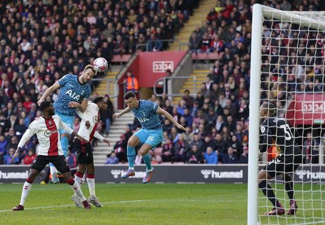 Harry Kane (left) scores Tottenham's second goal