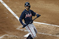 Atlanta Braves' Dansby Swanson reacts after striking out against Philadelphia Phillies starting pitcher Jake Arrieta during the third inning of a baseball game, Saturday, Aug. 8, 2020, in Philadelphia. (AP Photo/Matt Slocum)