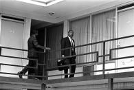 <p>Dr. Martin Luther King Jr. walks across the balcony of the Lorraine Motel shortly after arriving in Memphis, Tenn., on April 3, 1968, at approximately the spot where he was shot by a hidden assassin on April 4, 1968. (Photo: Charles Kelly/AP) </p>