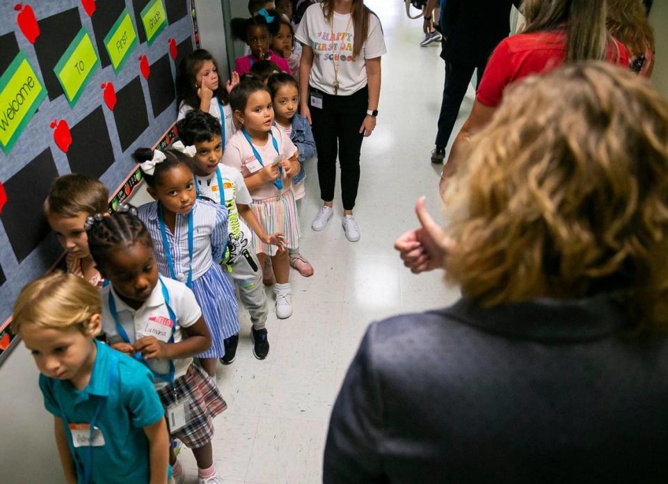 Broward County School Superintendent Vickie Cartwright greets students as they arrive for the first day of school at Tropical Elementary School in Plantation on Tuesday, Aug. 16, 2022.