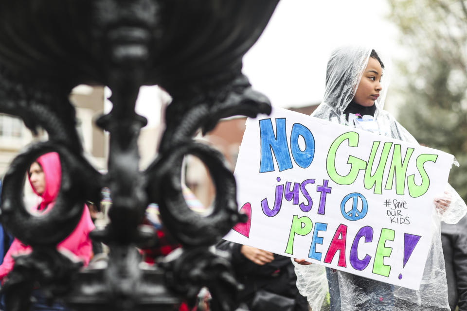 <p>Camryn Fidilio, 7, of Bowling Green, holds a sign during the “March for Our Lives” on Saturday, March 24, 2018, outside of Cherry Hall at Western Kentucky University in Bowling Green, Ky. Summoned to action by student survivors from Marjory Stoneman Douglas High School in Parkland, Fla., hundreds of thousands of teenagers and their supporters rallied in the nation’s capital and cities across the U.S. on Saturday to press for gun control. (Austin Anthony/Daily News via AP) </p>