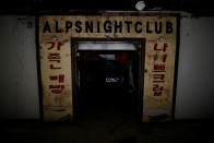 <p>An entrance of the Alps nightclub is seen at the abandoned Alps Ski Resort located near the demilitarized zone separating the two Koreas in Goseong, South Korea, Jan. 17, 2018. (Photo: Kim Hong-Ji/Reuters) </p>