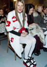 <b>New York Fashion AW13: Weird and wonderful runway looks<br><br></b>Anna Dello Russo hits the FROW in yet another bizarre look, this time opting for those odd Prada sandals - teaming them with white tights of all things.