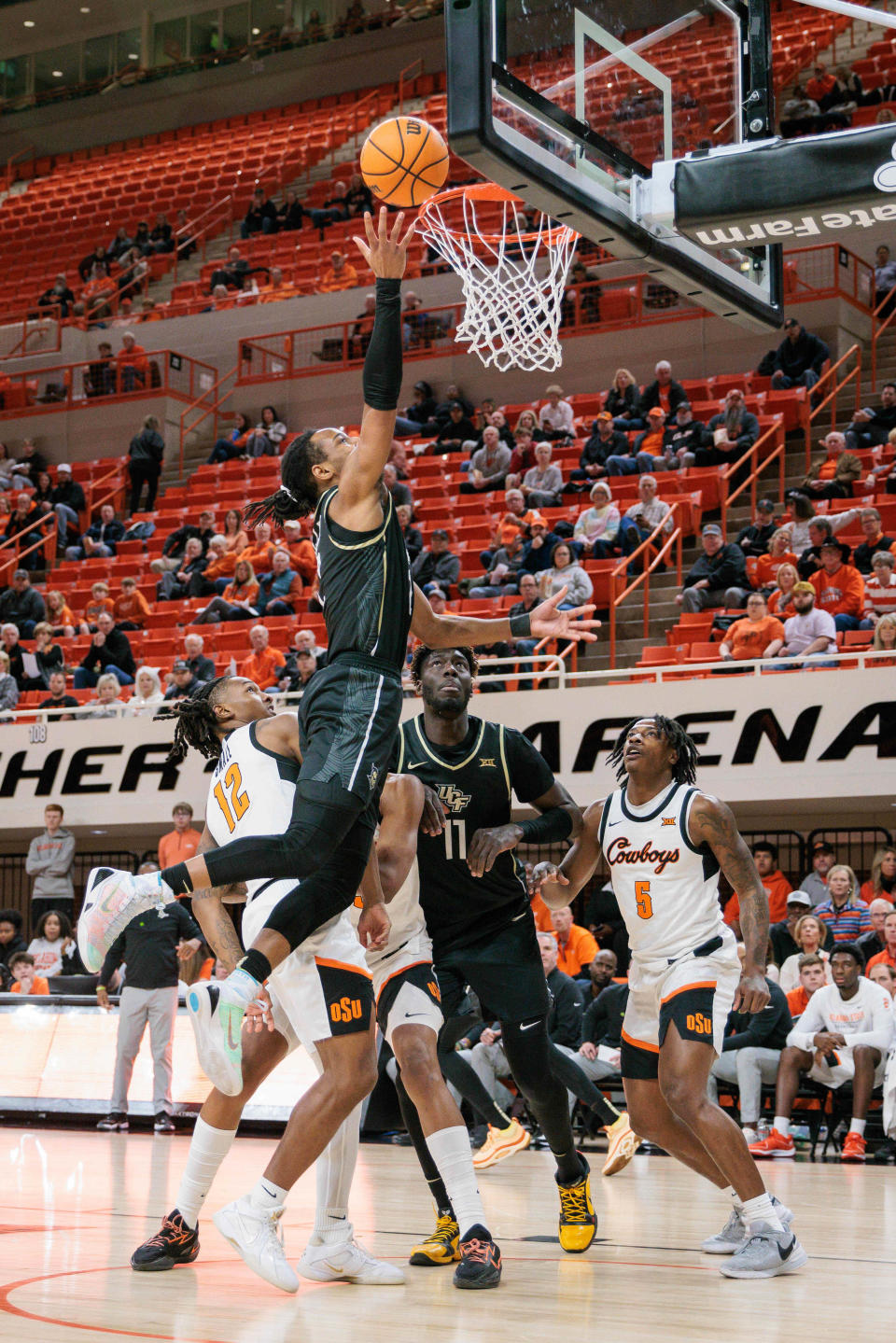 Feb 28, 2024; Stillwater, Oklahoma, USA; UCF Knights guard Shemarri Allen (2) shoots the ball during the first half against the Oklahoma State Cowboys at Gallagher-Iba Arena. Mandatory Credit: William Purnell-USA TODAY Sports