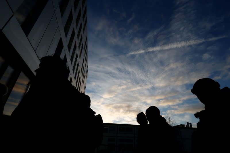 Activists and lawyers at the District Court of West Lausanne before the trial of twelve activists for a protest inside a branch of Credit Suisse bank in 2018 in Renens