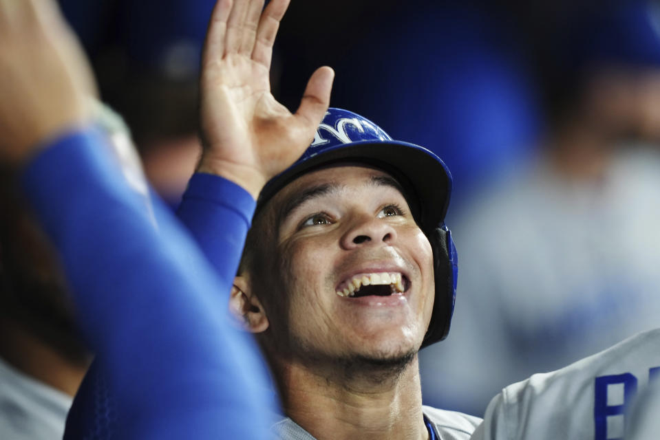 Kansas City Royals' Freddy Fermin celebrates in the dugout after scoring against the Toronto Blue Jays during the seventh inning of a baseball game Friday, Sept. 8, 2023, in Toronto. (Nathan Denette/The Canadian Press via AP)