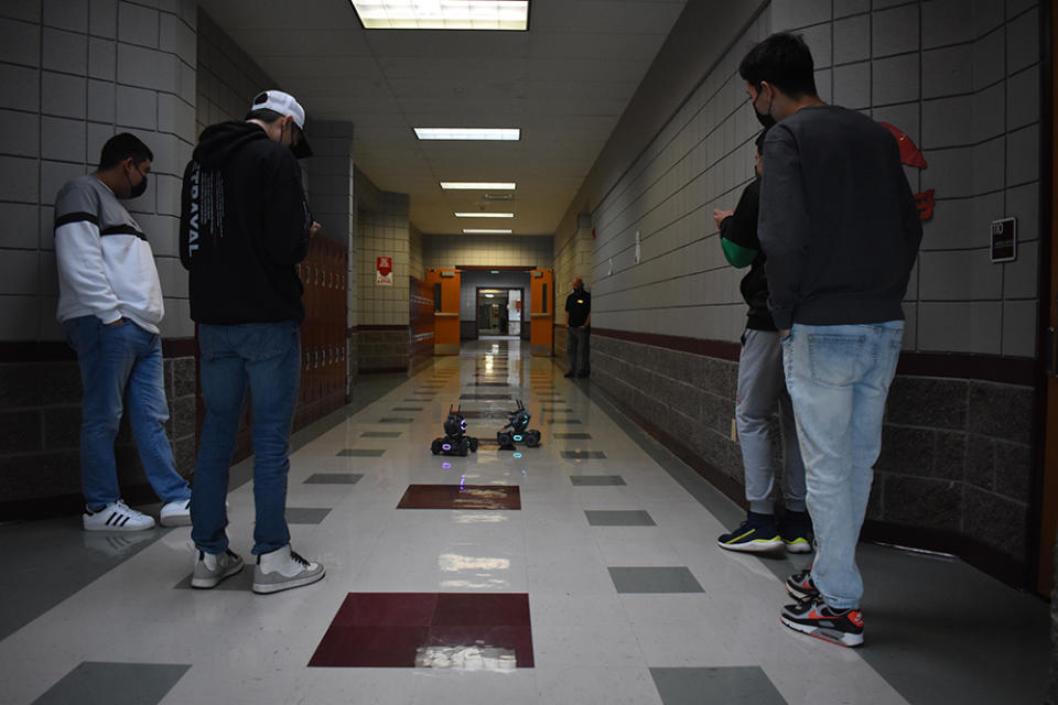 Tenth and eleventh graders at Highland School District 203 in Cowiche, Washington, work on robotics in a special program designed to remediate students who need help and enrich those who are on par. (Mindy Schultz)