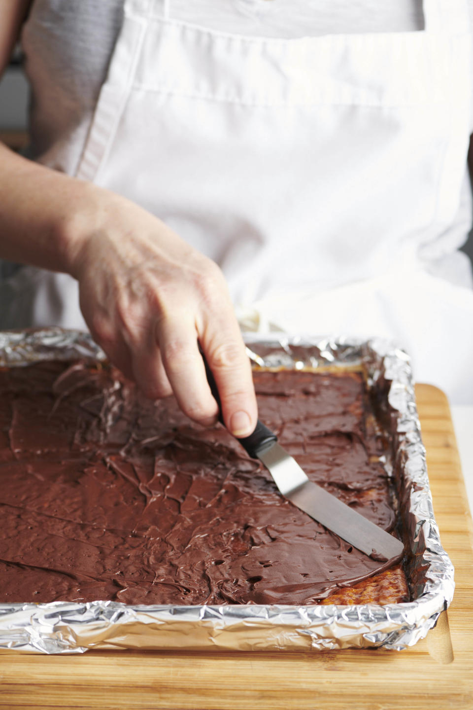 This photo shows chocolate toffee covered matzoh. Chocolate-covered caramel matzo, also known as Matzoh Buttercrunch, has become a popular Passover dessert. (Cheyenne Cohen via AP).