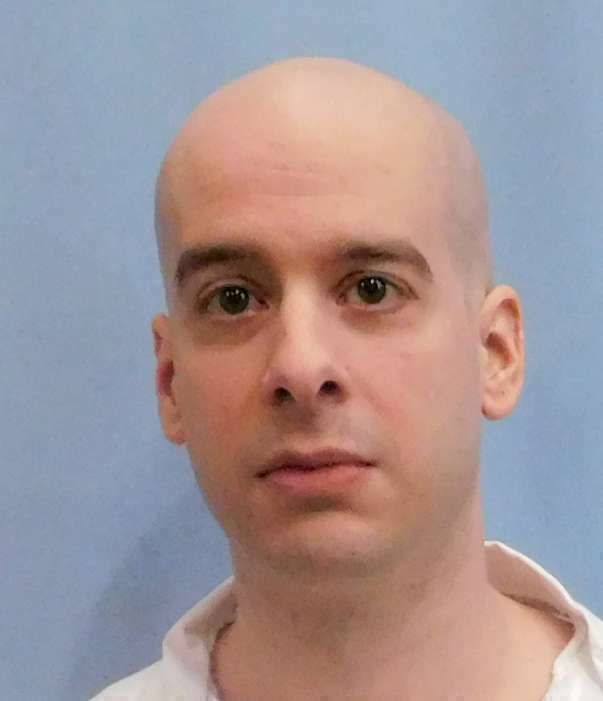 FILE - This photo provided by the Alabama Department of Corrections shows Michael Brandon Samra. His attorney has asked the governor to halt his Thursday, May 16, 2019 lethal injection while a Kentucky court weighs the appropriateness of the death penalty for people who were under 21 at the time of their crimes. Samra was 19 when he participated in the 1997 slayings in Shelby County of four people, including two children. (Alabama Department of Corrections via AP)