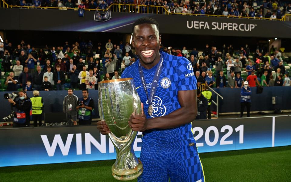 Kurt Zouma of Chelsea celebrates with the UEFA Super Cup Trophy following victory in the UEFA Super Cup 2021 match between Chelsea FC and Villarreal CF at the National Football Stadium at Windsor Park on August 11, 2021 in Belfast, Northern Irelan - Chelsea FC via Getty Images)/Darren Walsh 