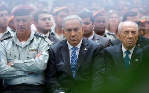 Mr Netanyahu (centre) and Mr Gantz (left) once worked closely together - Credit: Photo by Jim Hollander - Pool/Getty Images