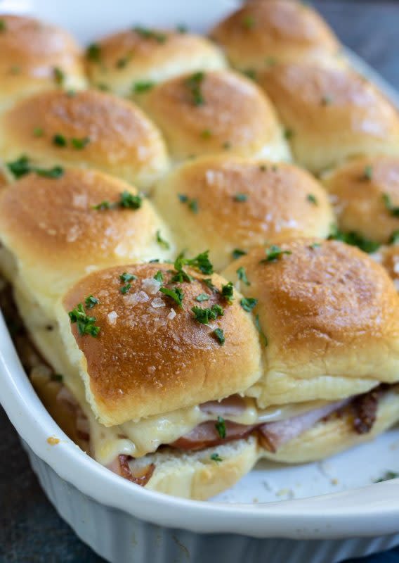 <p>Wonky Wonderful</p><p>A great way to use up that leftover holiday ham and serve a crowd for parties or game days.</p><p><strong>Get the recipe: <a href="https://wonkywonderful.com/ham-and-cheese-sliders/" rel="nofollow noopener" target="_blank" data-ylk="slk:Ham and Cheese Sliders on Hawaiian Rolls;elm:context_link;itc:0;sec:content-canvas" class="link ">Ham and Cheese Sliders on Hawaiian Rolls</a></strong></p>