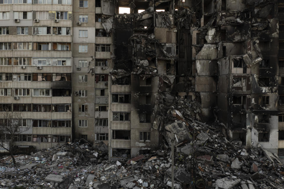 A building heavily damaged by multiple Russian bombardments stands near a frontline in Kharkiv, Ukraine, Monday, April 25, 2022. (AP Photo/Felipe Dana)