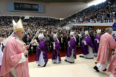 Pope Francis holds a mass at Prince Moulay Abdellah sports complex in Rabat, Morocco, March 31, 2019. Vatican Media/Handout via REUTERS