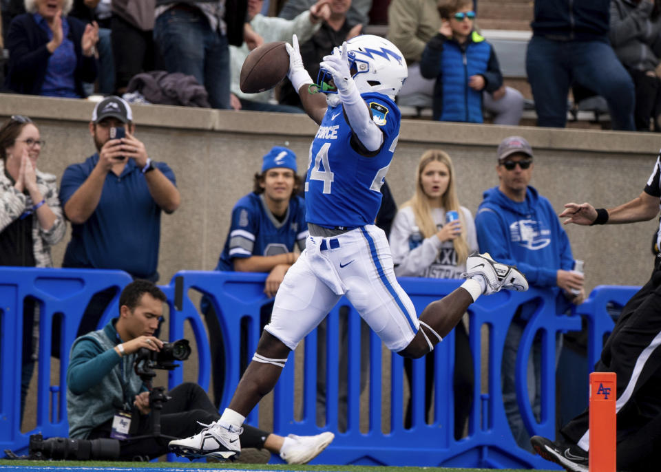 Air Force running back John Lee Eldridge III (24) runs in a touchdown against UNLV in the first half of an NCAA college football game Saturday, Nov. 18, 2023, at Air Force Academy, Colo. (Parker Seibold/The Gazette via AP)