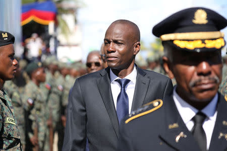 Haitian President Jovenel Moise inspects the troops before a parade of the Haitian Armed Forces (FAD'H) in the streets of Cap-Haitien, Haiti, November 18, 2017. REUTERS/Andres Martinez Casares