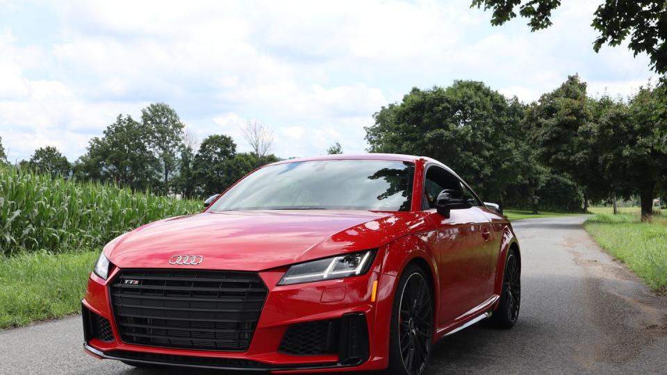 2023 audi tts in red parked on new jersey farmland