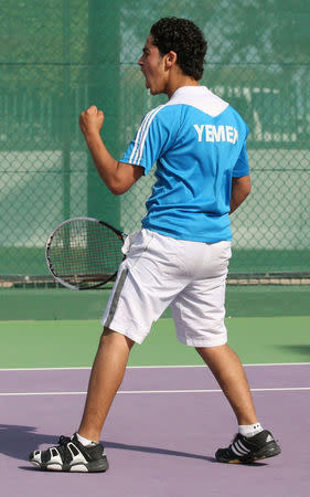 Alhassan Ishaq celebrates after winning a point during a tennis match in the Asia under 14 Championship tournament in Doha, Qatar, March 6, 2017. Picture taken March 6, 2017. REUTERS/Naseem Zeitoon